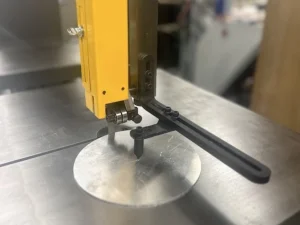 STARTRITE SM260 CIRCLE CUTTING ATTACHMENT with metal disc cut using the attachment.