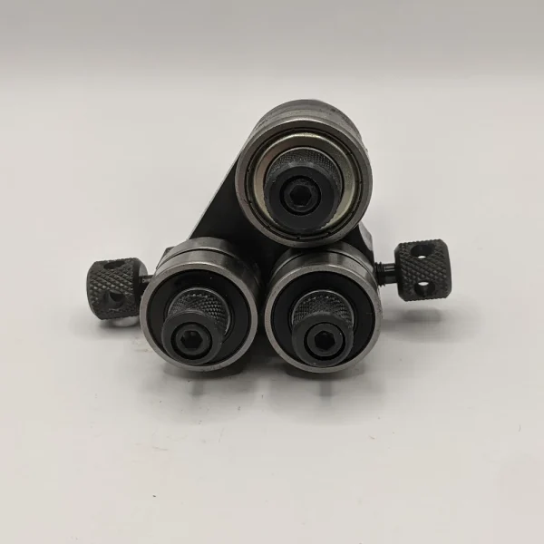 Lower Universal Roller Guide assembly, suitable for the Startrite S, V, T & R model bandsaws. Most suited to high speed sawing