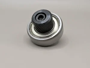 Startrite thrust roller assembly for use on the universal roll blade guides